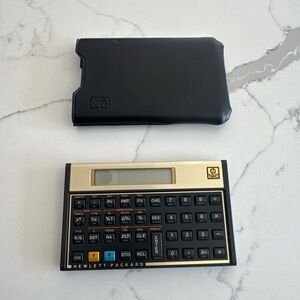 HP Gold and Black Financial Calculator with Protective Sleeve need batteries
